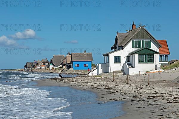 Thatched roof houses on the beach, Graswarder peninsula