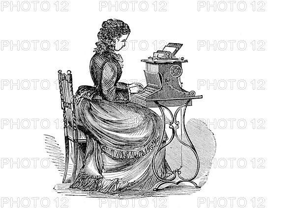 Woman working at a typewriter, secretary