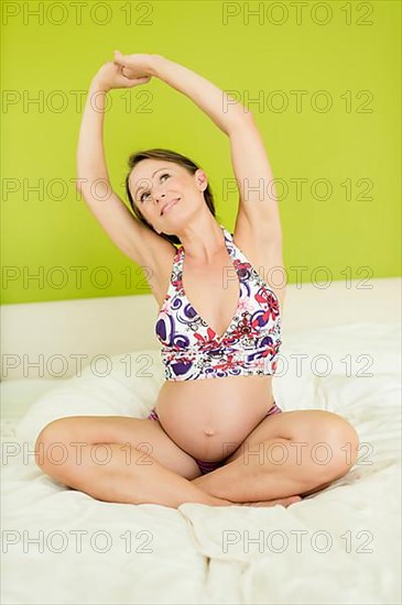 Pregnant woman in the park,