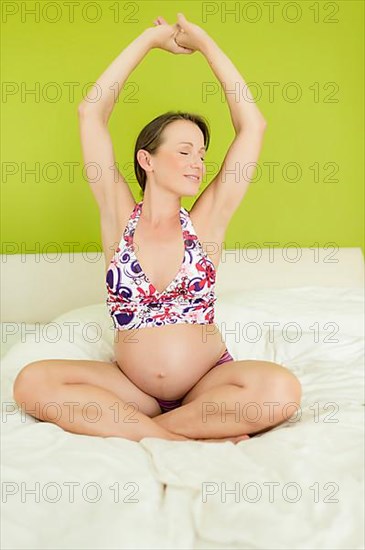 Pregnant woman in the park,