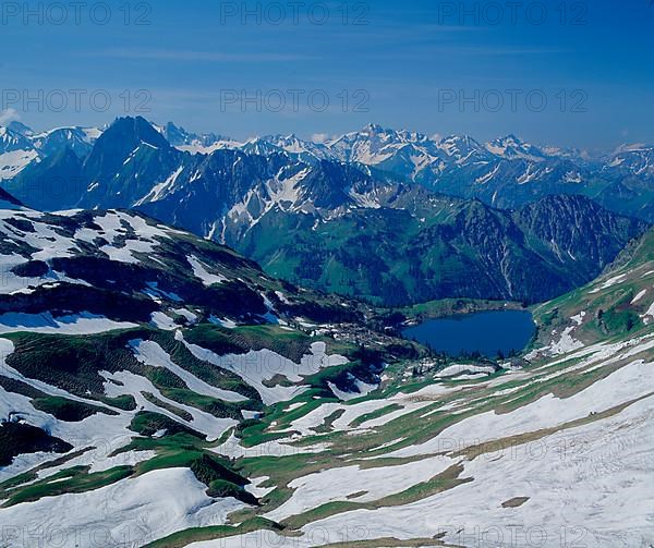 View from the foghorn on the lake Seealpsee Allgaeu and the Austrian Alps Look of the foghorn on the lake nightmare lake Allgaeu and the Austrian Alps,