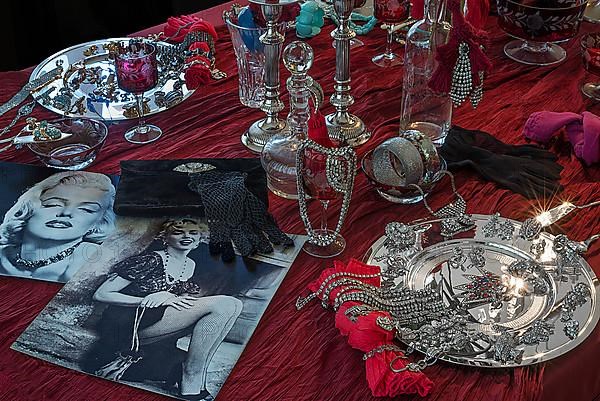 Rhinestone jewellery and accessories decorated on a silver plate and red cloth, Bavaria