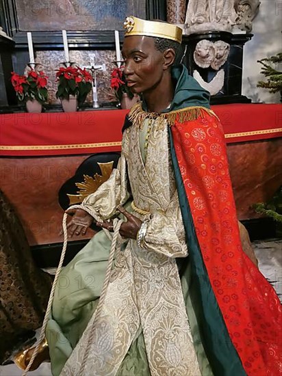 The dark-skinned one of the Magi, Melchior