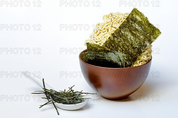 Nori, dried papery sheets of seaweed and Asian noodles in shells