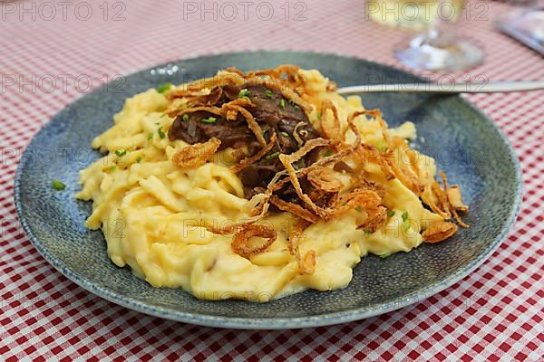 Swabian cuisine, cheese spaetzle with braised onions