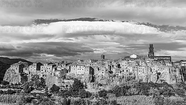 Panoramic view of the medieval town of Pitigliano, black and white photograph