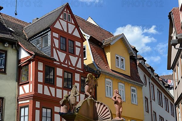 Half-timbered house with well in Wertheim am Main, Baden-Wuerttemberg