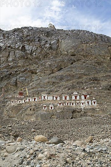 Small white stupa on the mountainside, Hunder Gompa