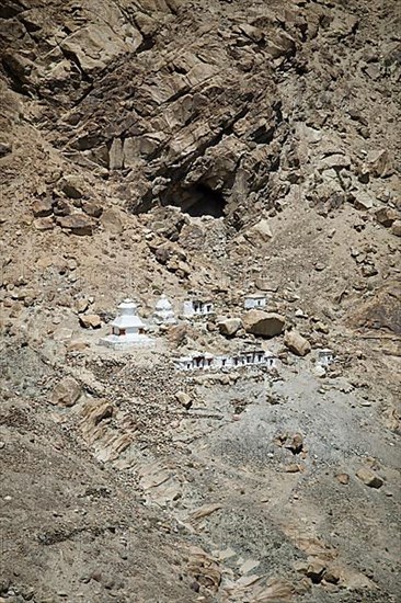 Small white stupa on the mountainside, Hunder Gompa