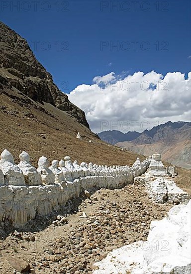 Small white stupa on the mountainside, Hunder Gompa