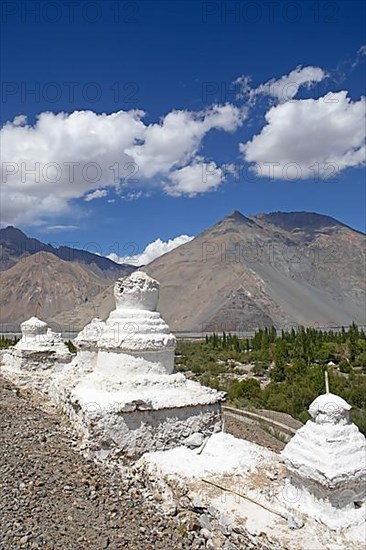 Small white stupa on the mountainside, Hunder Gompa