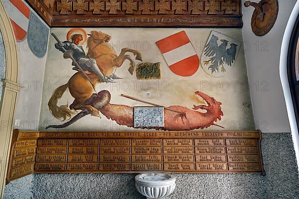 War memorial with mural Dragon Slayer, Catholic Parish Church