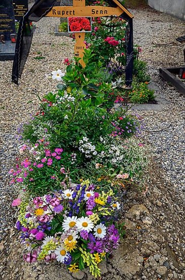 Grave at the cemetery of the Catholic Parish Church, Maria-Opferung