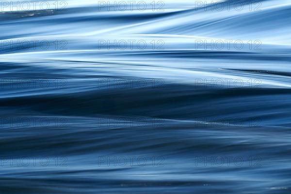 Blue Zambezi River rapids close up photographed long exposure to display motion, Zambezi River