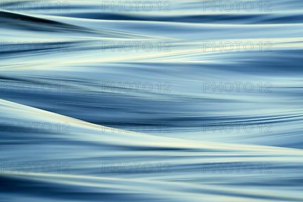 Blue Zambezi River rapids close up photographed long exposure to display motion, Zambezi River