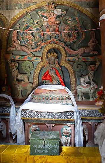 Black saint figure with prayer cloths, Lamayuru Monastery or Lamayuru Gompa