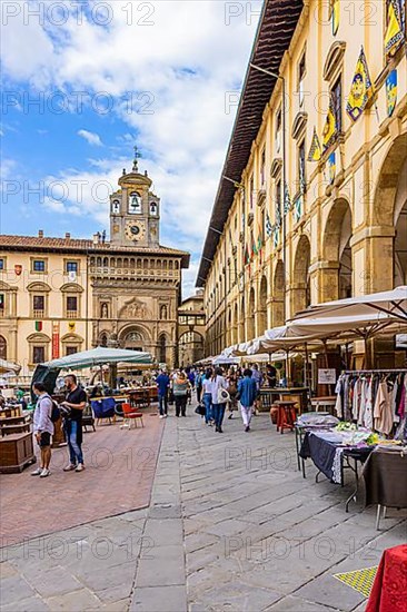 Stalls at the antique market in the old town of Arezzo, Piazza Grande