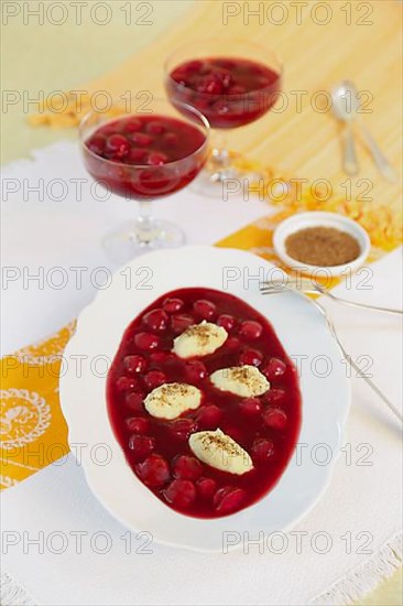 Swabian cuisine, sweet semolina dumplings with cherry compote