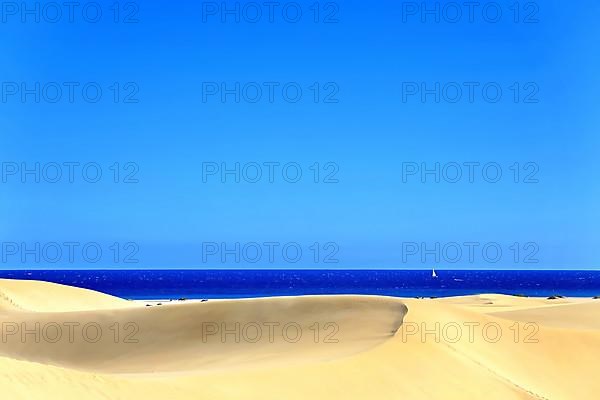 The dunes of Playa Del Ingles with a view of the Atlantic Ocean. San Bartolome de Tirajana, Gran Canaria