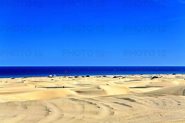 The dunes of Playa Del Ingles with a view of the Atlantic Ocean. San Bartolome de Tirajana, Gran Canaria