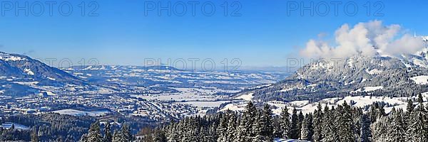 Wonderful winter landscape under a blue sky with a view of the Alpine foothills. Sonthofen, Oberallgaeu