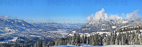 Wonderful winter landscape under a blue sky with a view of the Alpine foothills. Sonthofen, Oberallgaeu