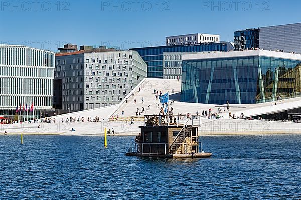 Sauna boat, floating sauna in front of the opera in summer