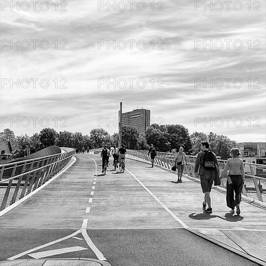 Pedestrians and cyclists on bridge over Inner Harbour, Lille Langebro cycle bridge