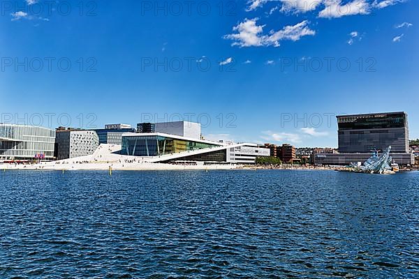 View from the promenade over the Oslofjord to Deichman Library, Opera House and Munch Museum