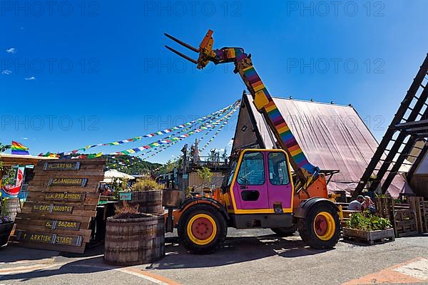 Telescopic forklift, construction machine painted in rainbow colours