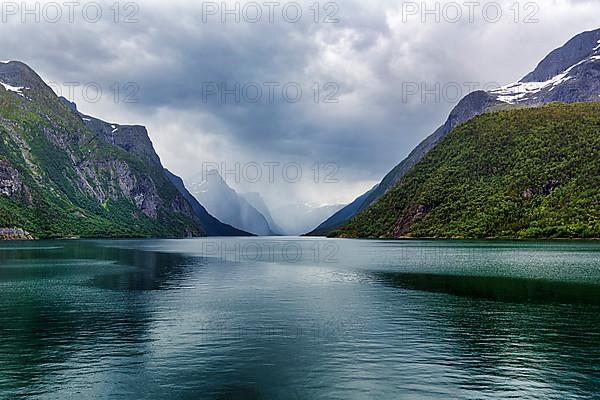 Lake Eikesdal, Eikesdalvatnet with high cloudy mountains