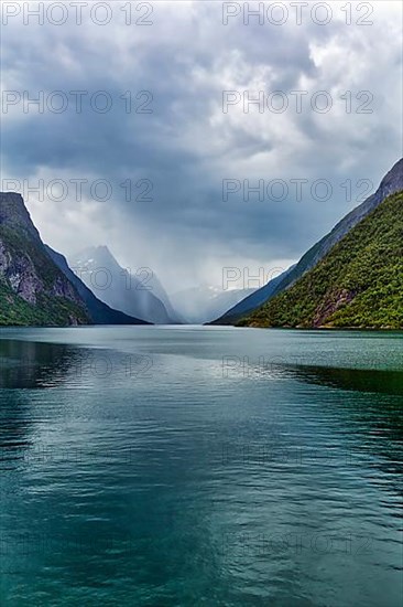 Lake Eikesdal, Eikesdalvatnet with high cloudy mountains