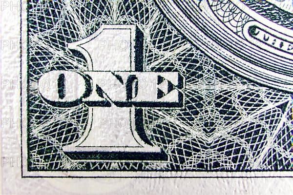 Macro of one dollar note greatly enlarged,