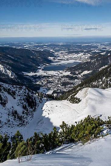 View from the top of the Jagerkamp to Schliersee and village, mountains in winter