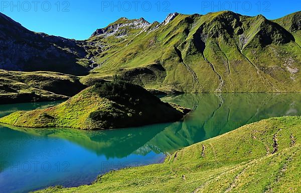 The Schrecksee is a small high-mountain lake with an impressive panorama. Hinterstein, Allgaeu Alps