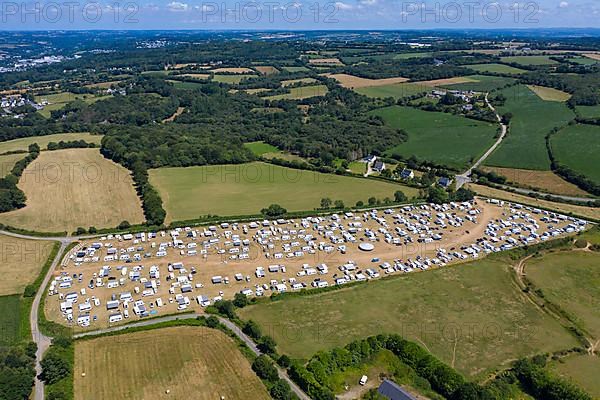 Aerial view of Gens de Voyage or Travelling People camp set up without permission in a field in Dirinon, Finistere Penn-ar-Bed department