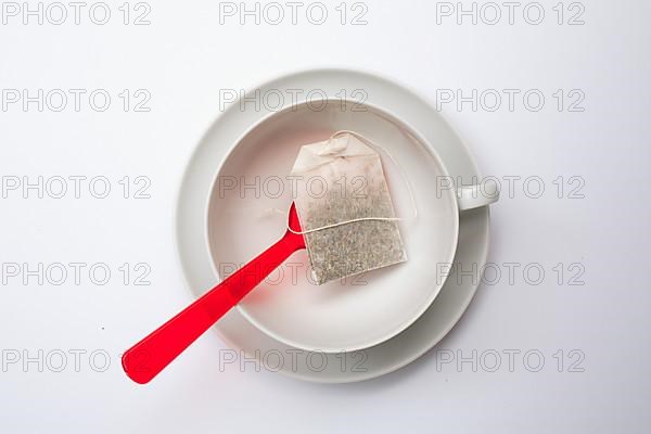 Tea bag in an empty cup,