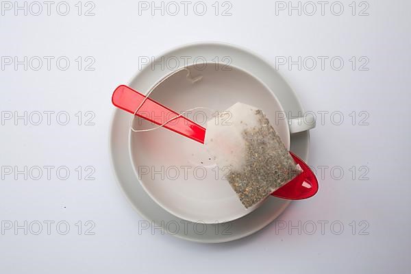 Tea bag in an empty cup,