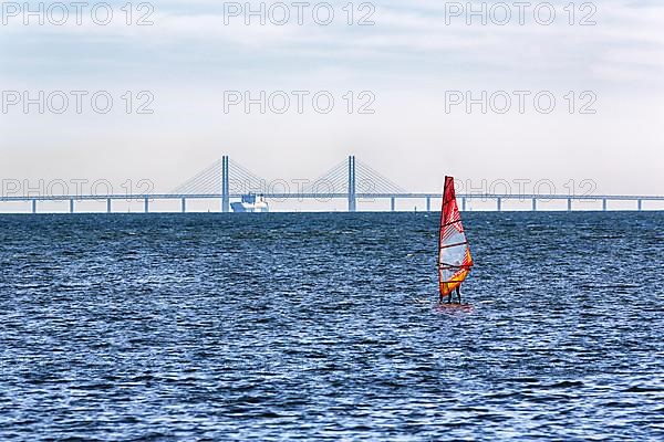 Windsurfers in front of the Oeresund Bridge, Oresundsbroen between Malmoe and Copenhagen