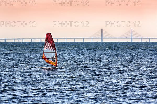 Windsurfers in front of the Oeresund Bridge, Oresundsbroen between Malmoe and Copenhagen