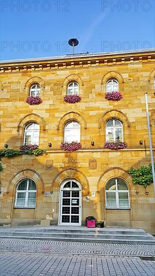 The town hall of Wassertruedingen in fine weather. Wassertruedingen, Ansbach