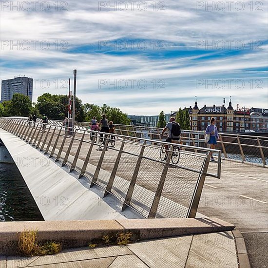 Pedestrians and cyclists on bridge over Inner Harbour, Lille Langebro cycle bridge