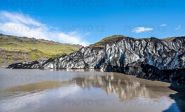 Glacial fracture at glacier tongue with lake, Solheimajoekull