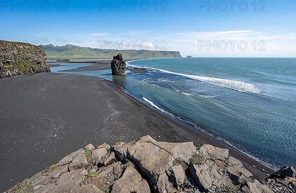 Rocks in the sea, View over Reynisfjara Beach