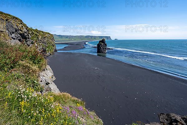 Rocks in the sea, View over Reynisfjara Beach