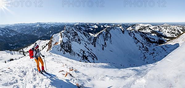 Ski tourers in winter on the snow-covered Rotwand, mountains in winter