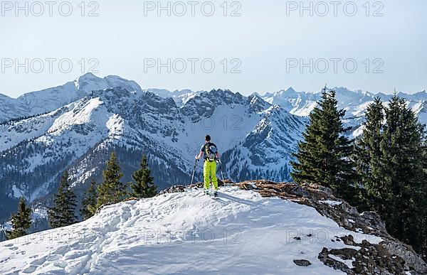 Ski tourers on their way to the Rotwand, mountains in winter