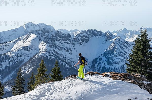 Ski tourers on their way to the Rotwand, mountains in winter