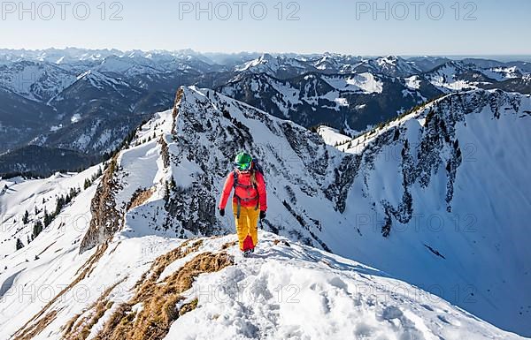 Ski tourers in winter on the snow-covered Rotwand, mountains in winter