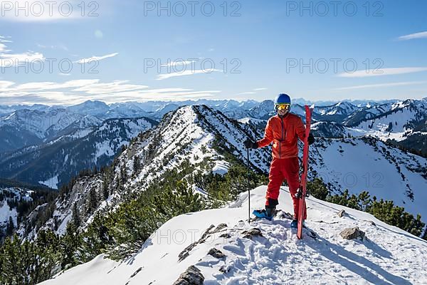 Ski tourers at the summit of the Jagerkamp, winter